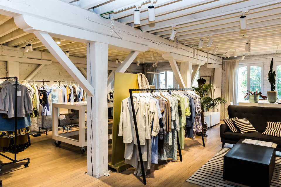Stijlvolle en strakke shoplighting voor Barcatex Antwerpen